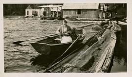 Lilian Stewart in boat, rowing between Portage Park and Hallowell Road