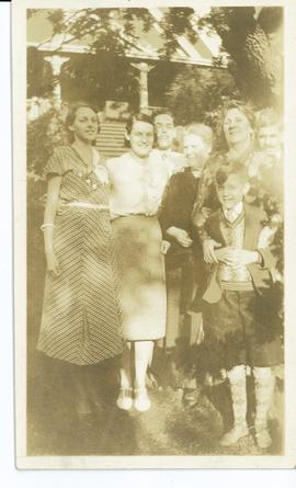 Family in font of house, 1315 Camosun Street; Possible identifications (L-R) Annie Rena, Velda, C...