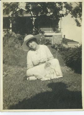 Woman on front lawn of 1315 Camoson Street